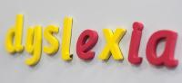fridge alphabet magnets spell 'Dsylexia' 